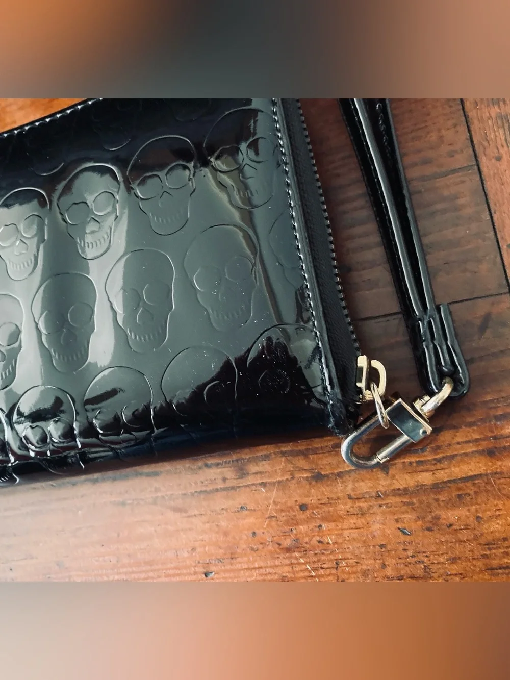 Betsey Johnson Black Patent Skull-Embossed Zip Wallet with Gold Plaque